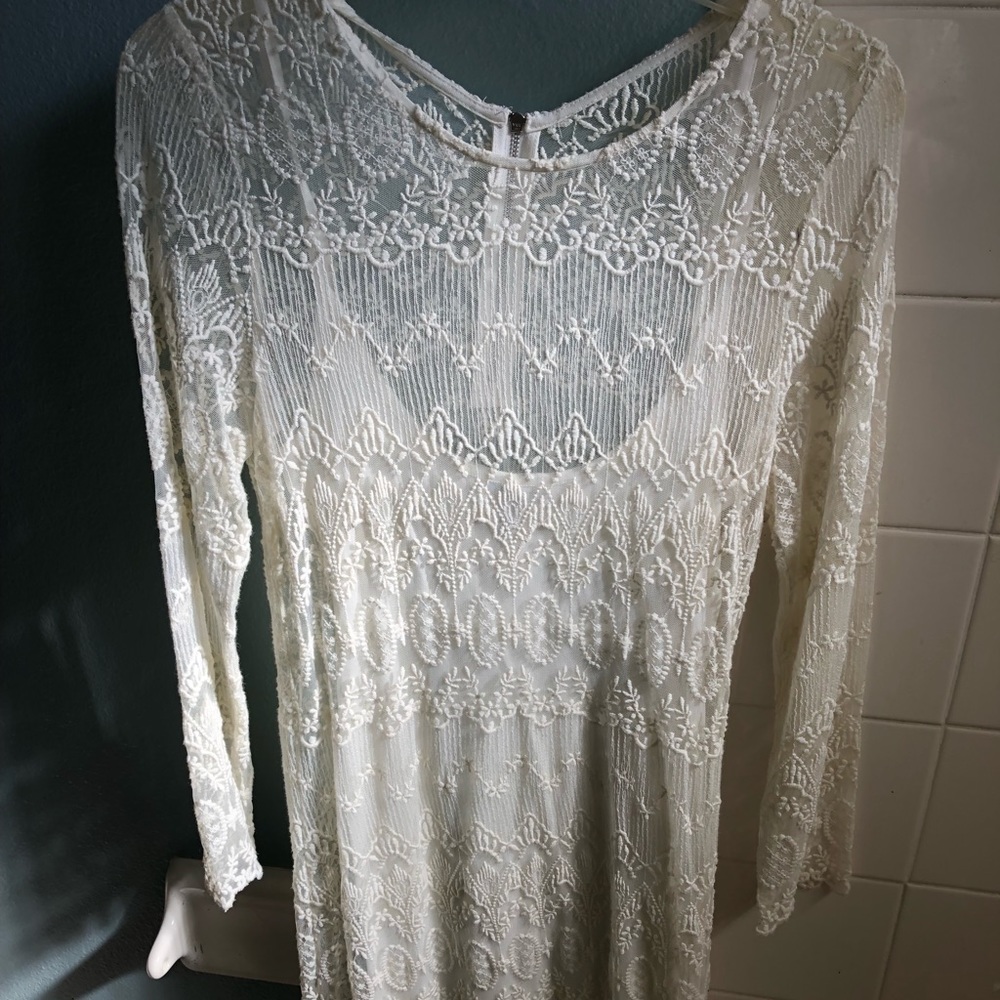 Cream long sleeved lace dress